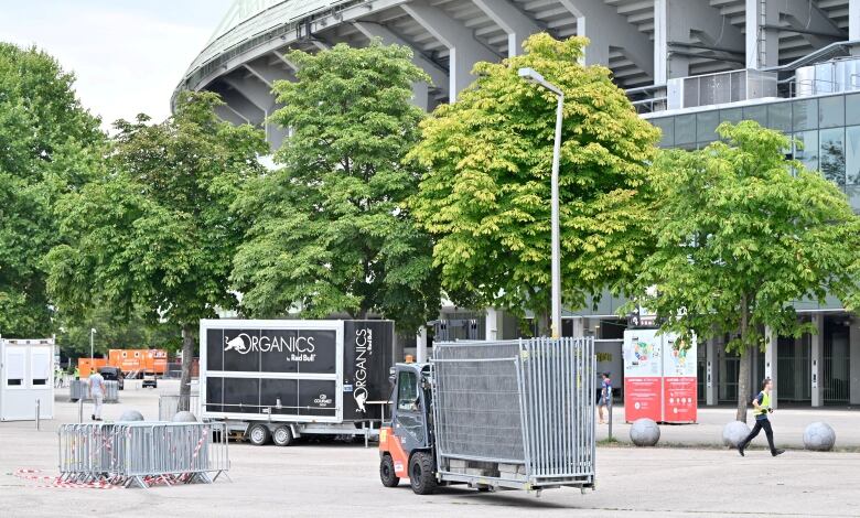 The exterior of a stadium is shown.