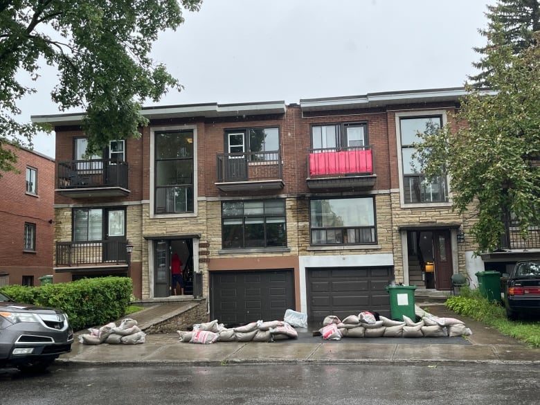 sandbags in front of homes