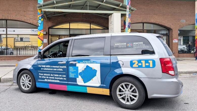 a van parked outside with mental health support information on the side