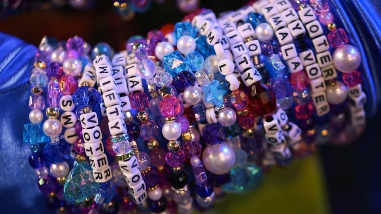 A shot of an arm covered in friendship bracelets