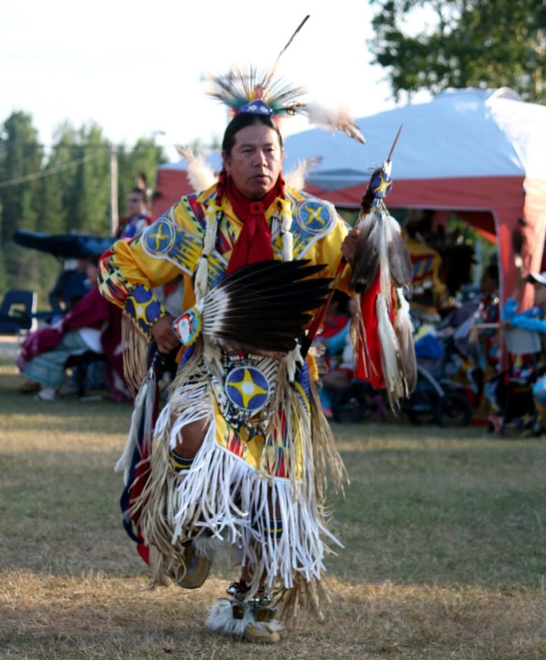 Man in regalia.