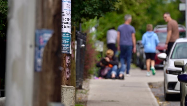 people near a safe drug consumption site