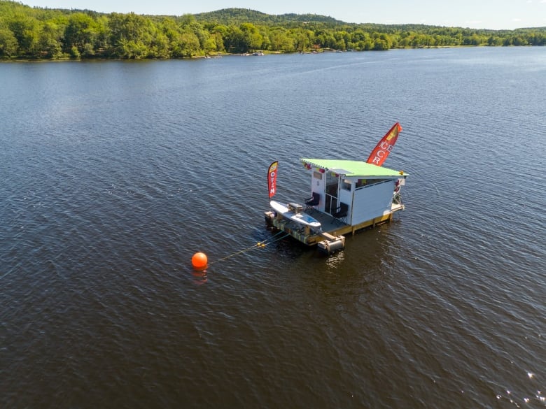 A shack floating in the water