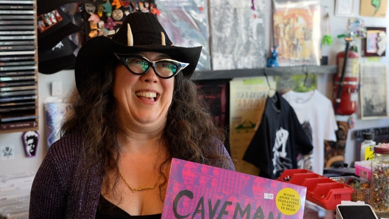 Valentina Cardinalli smiles in her record shop. 