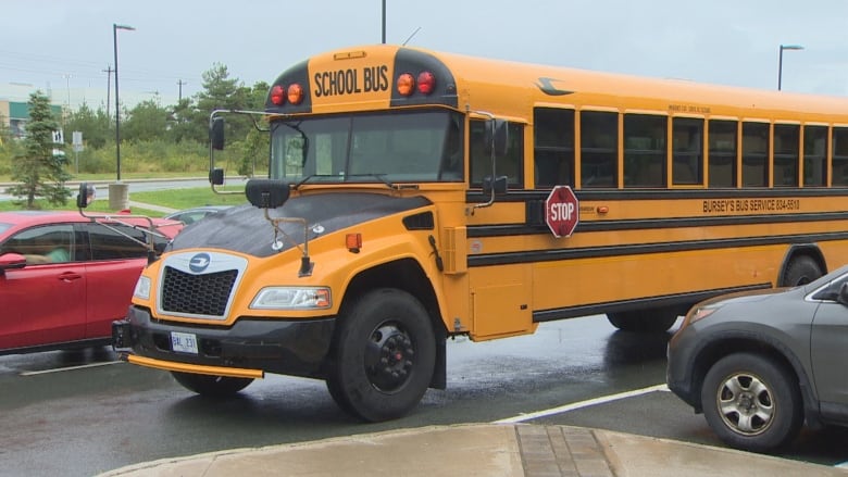 A school bus sits in a parking lot.