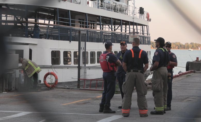 Emergency services on the dock at the Jack Layton Ferry Terminal in Toronto on Sept. 5, 2024. In the background is the William Inglis ferry.