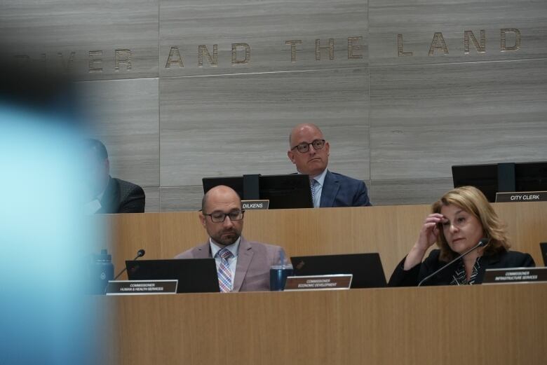 Windsor Mayor Drew Dilkens sits in his chair at a city council meeting