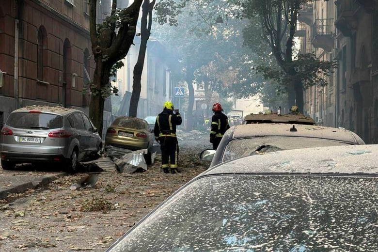 In this photo provided by the Lviv City Council, firefighters work near a residential building damaged by a Russian strike in Lviv, Ukraine, Wednesday, Sept. 4, 2024. (Lviv City Council via AP)