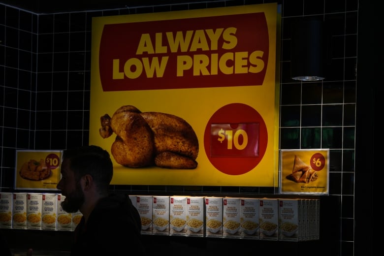 A sign advertising low prices is seen at a No Frills Grocery store in Toronto, Thursday, May 30, 2024.