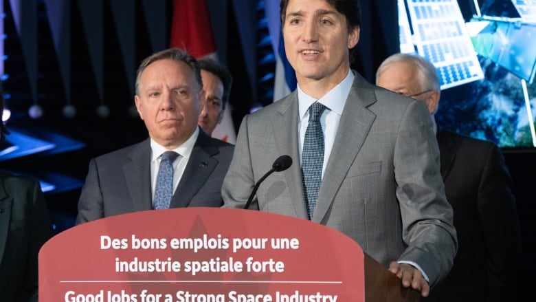 Prime Minister Justin Trudeau and Quebec Premier Francois Legault, left, make an aerospace announcement at the MDA satellite manufacturing centre Friday, September 13, 2024 in Ste.Anne-de-Bellevue, Quebec.