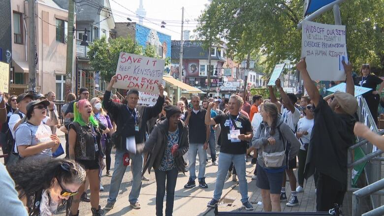 Photo of people rallying outside an overdose prevention site