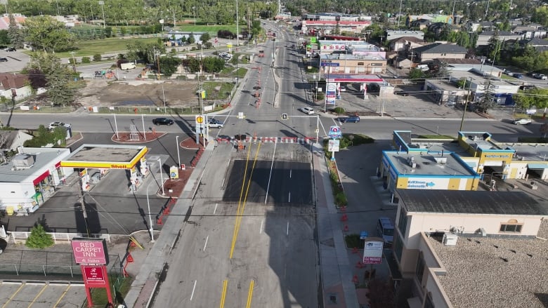 An aerial shot of a repaved section of a roadway.