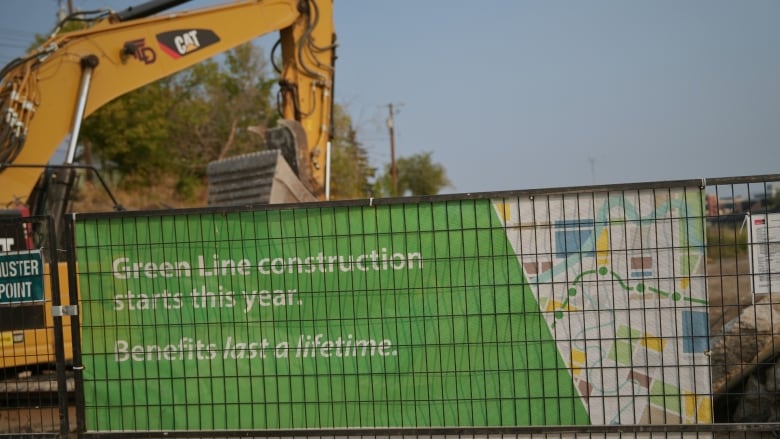 A green sign that reads 