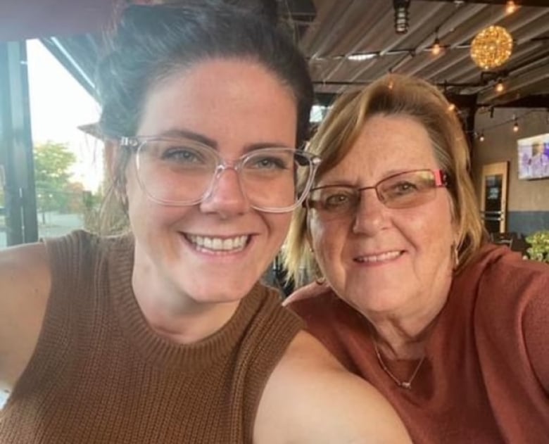 Two women posing for a selfie.