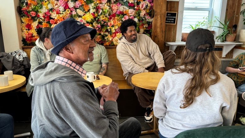 People sitting at tables.