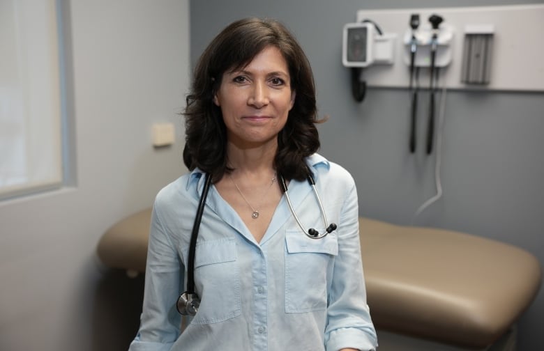 Dr. Kimberly Wintemute in an examining room at her clinic.  