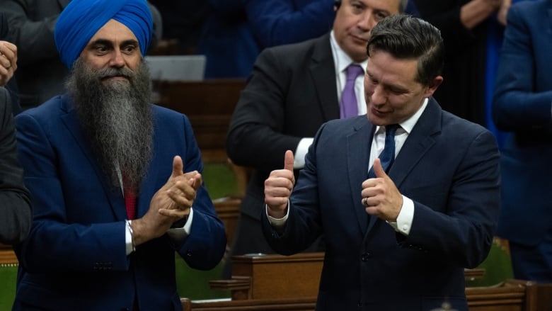 Conservative Leader Pierre Poilievre gives the thumbs up as he votes on a motion of confidence in the government following Question Period, Wednesday, September 25, 2024 in Ottawa.