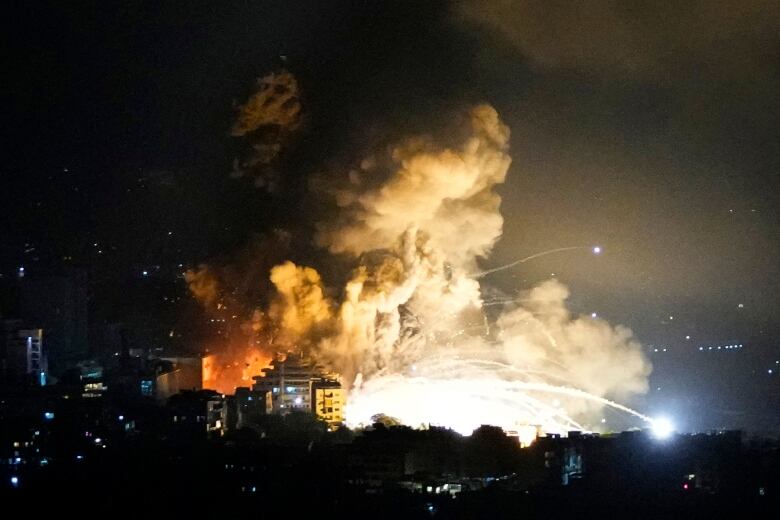 A building with smoke coming out of it. 