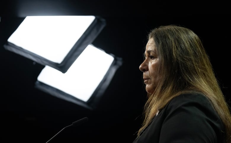 The Survivors Secretariat Executive Lead Laura Arndt is seen during a news conference on Parliament Hill, in Ottawa, Monday, Sept. 30, 2024.