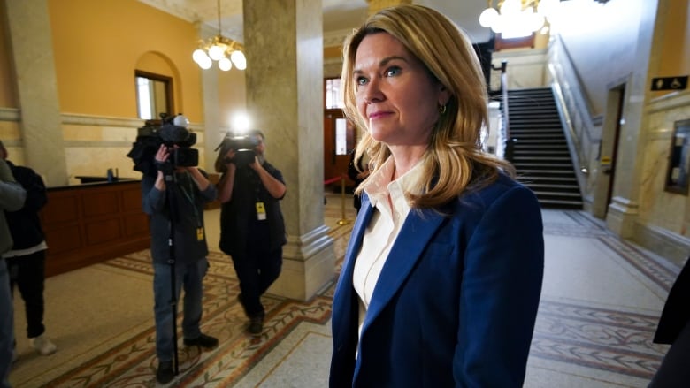 Ontario Minister Education Minister Jill Dunlop walks to a news conference at Queens Park in Toronto, on Feb. 26, 2024.