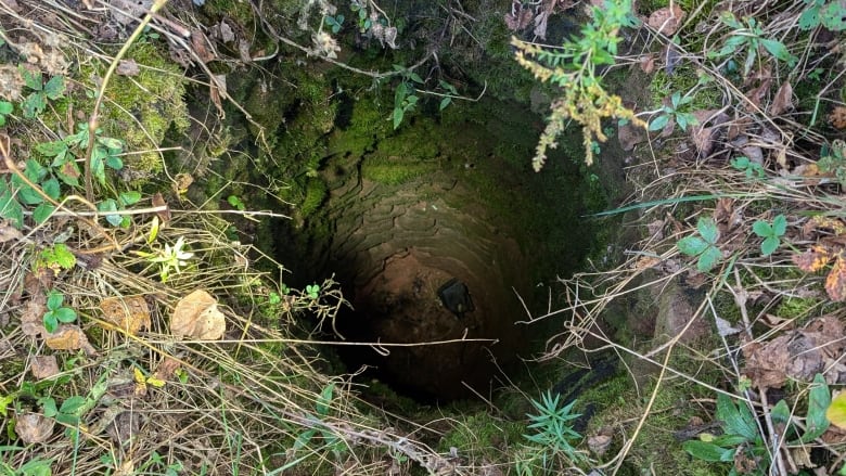 The view down an old sandstone well 