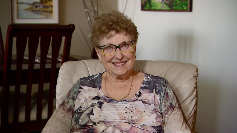 A woman sitting on a couch 