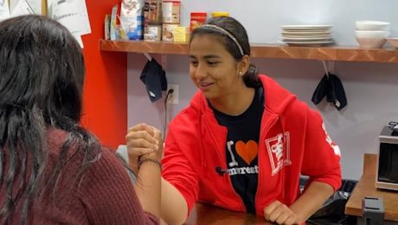 Teenager arm wrestling