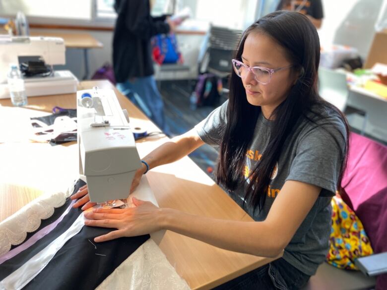 A girl sewing