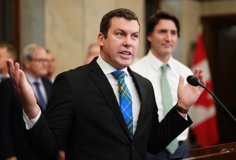 Kody Blois, chair of the national Liberal rural caucus and Nova Scotia Liberal caucus, speaks during a news conference as Prime Minister Justin Trudeau looks on in Ottawa on Thursday Oct. 26, 2023.