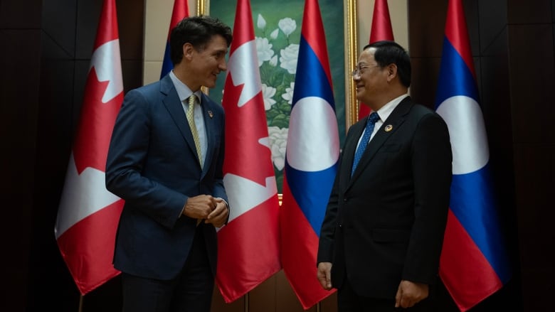 Prime Minister Justin Trudeau speaks with Laos Prime Minister Sonexay Siphandone at the ASEAN Summit in Vientiane, Laos, Thursday, Oct. 10, 2024.