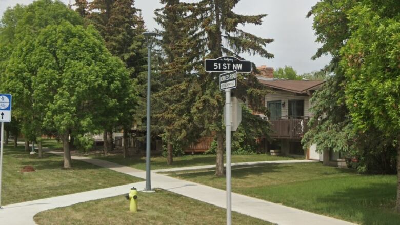 A street sign of the intersection of Bowness Road and 51 Street Northwest