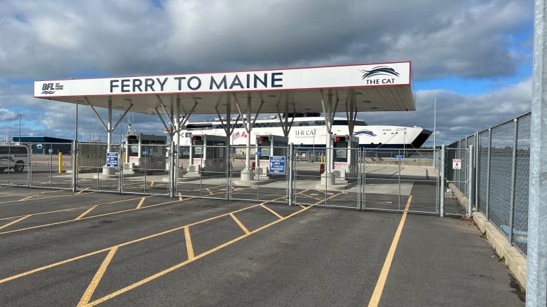 The Cat ferry to Yarmotuh is pictured behind closed off toll booths in Yartmouth, N.S. 