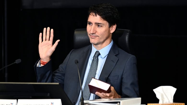 Prime Minister Justin Trudeau is sworn in as a witness at the Foreign Interference Commission in Ottawa, in Ottawa, on Wednesday, Oct. 16, 2024.