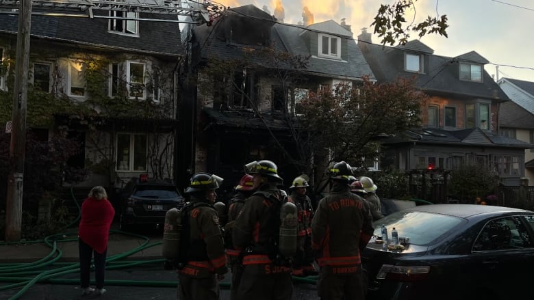 Firefighters at the scene of a blaze in the Beaches on Oct. 18, 2024.