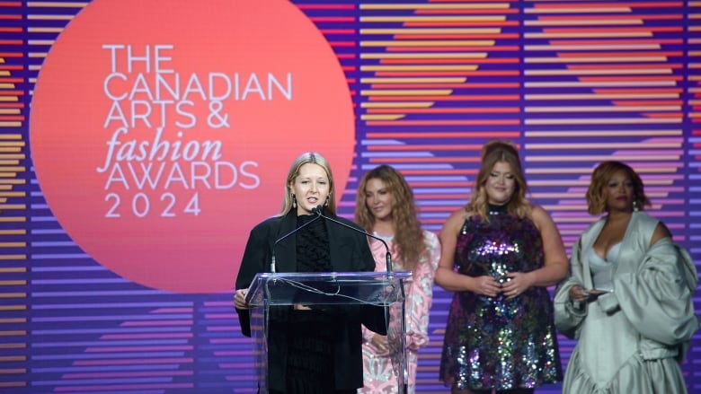 Chloe Gordon of Beaufille accepts the CAFA 2024 Womenswear Designer of the Year Award in Toronto on Oct.19, 2024.