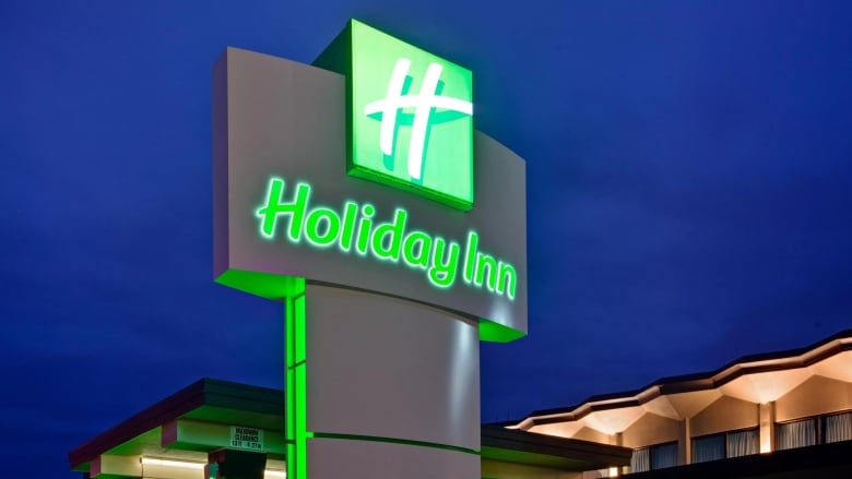 A sign that reads 'Holiday Inn.'