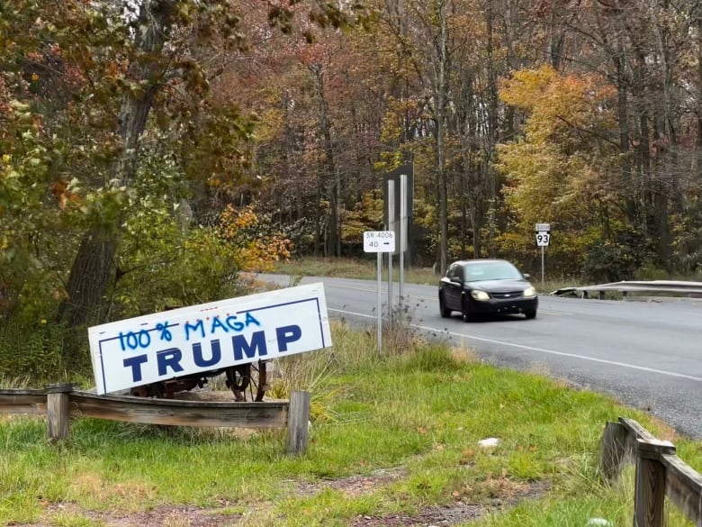 Sign off highway that says, 