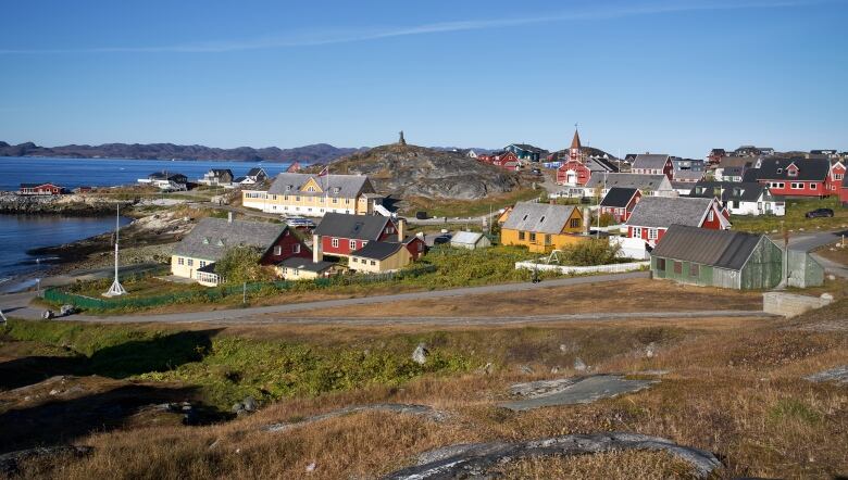 a series of colourful houses 