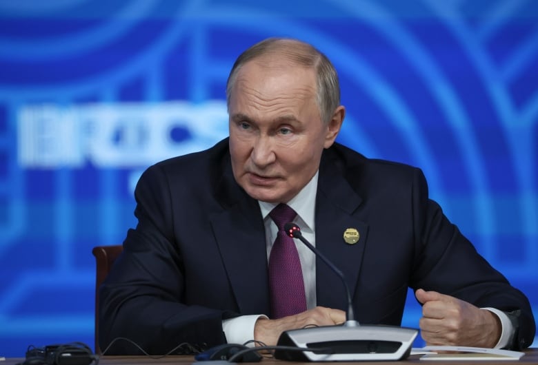 Russian President Vladimir Putin holds a press conference at BRICS Summit in Kazan, Russia, Thursday, Oct. 24, 2024.