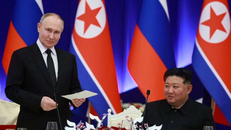 Russia's President Vladimir Putin and North Korea's leader Kim Jong Un attend a state reception in Pyongyang, North Korea June 19, 2024. 