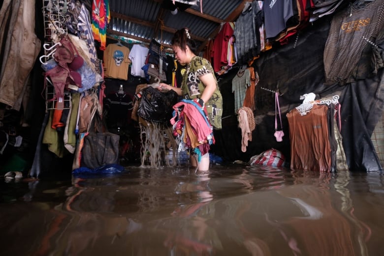 A flooded clothing shop. 