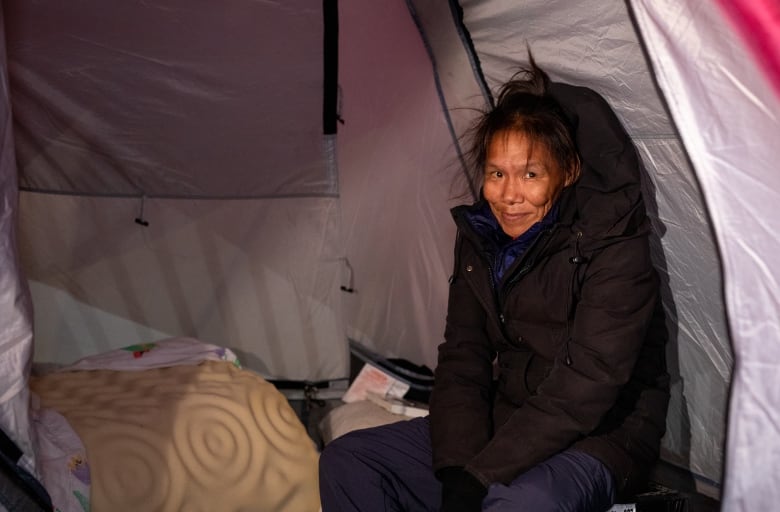 A woman in a tent