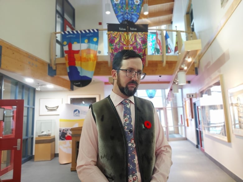 John Main standing at the legislature lobby