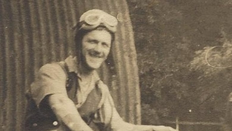 archival photo of walter chater on a motorcycle