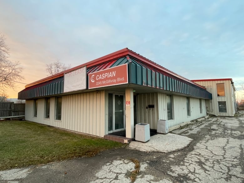 Image one-storey building with Caspian sign. 