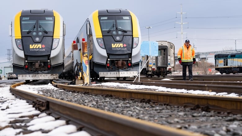 New passenger trains sit on the tracks at the Via Rail Canada Maintenance Centre in Montreal, Thursday, Feb. 22, 2024.