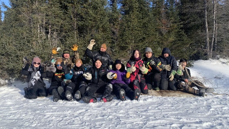 A group of kids in the snow. 