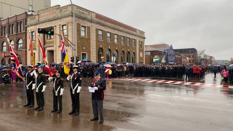 People gathering at the cenotaph in Charlottetown.