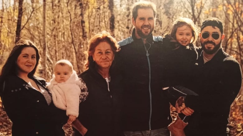 a family ophoto on a fall day. 