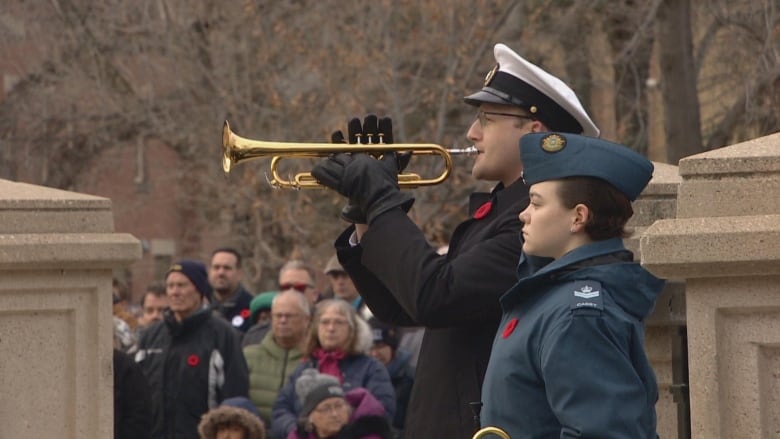 Man playing a trumpet.